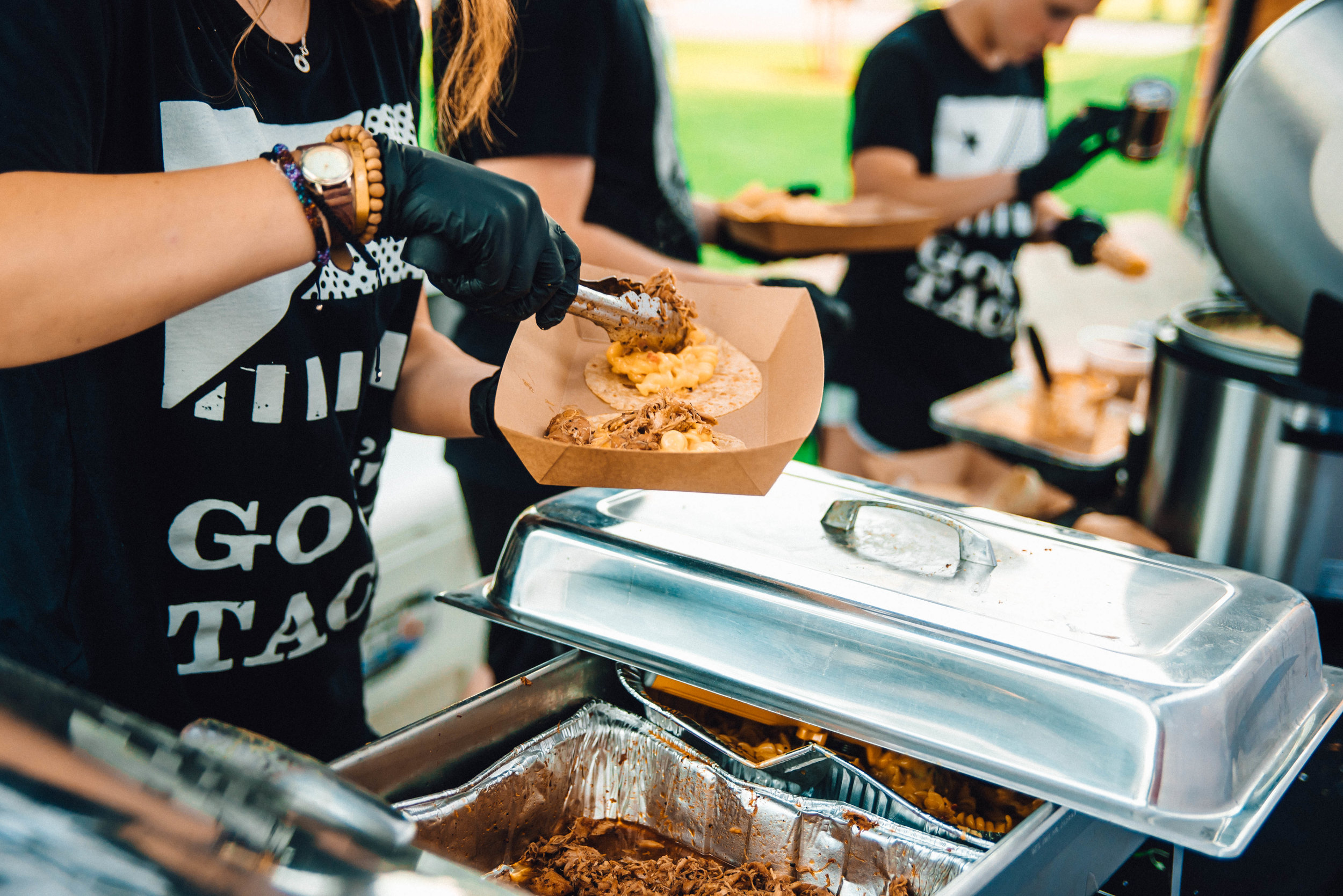 Building the Clucks and Balances taco at Toast Under The Oaks 7/8/17 Photo Credit: Jordan Hefler Photography