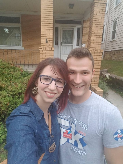 Me & Jon taking our first selfie in front of the house. Notice the falling down retaining wall and overgrown landscaping? Yep - lots of TLC.