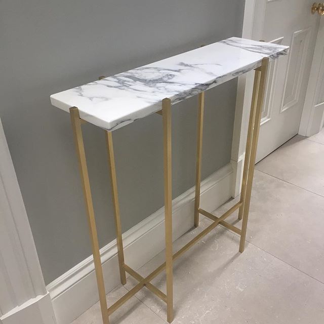 Brushed brass and marble console as seen in Emma O&rsquo;Connors beautiful home in Gloss Interiors @glossinteriors @emsudesign.com  #console #brass #marble