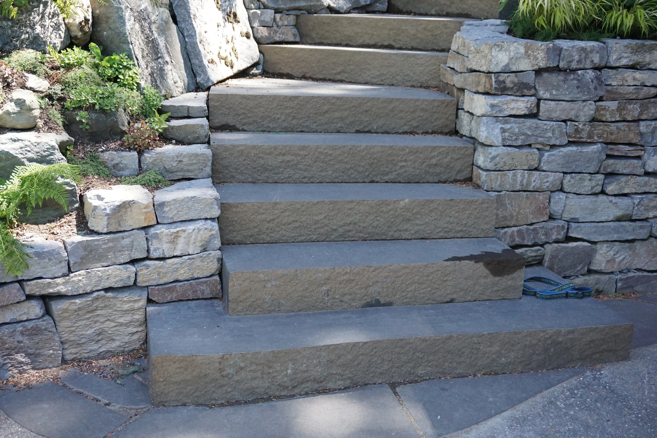 6. Basalt wall with basalt stair treads.