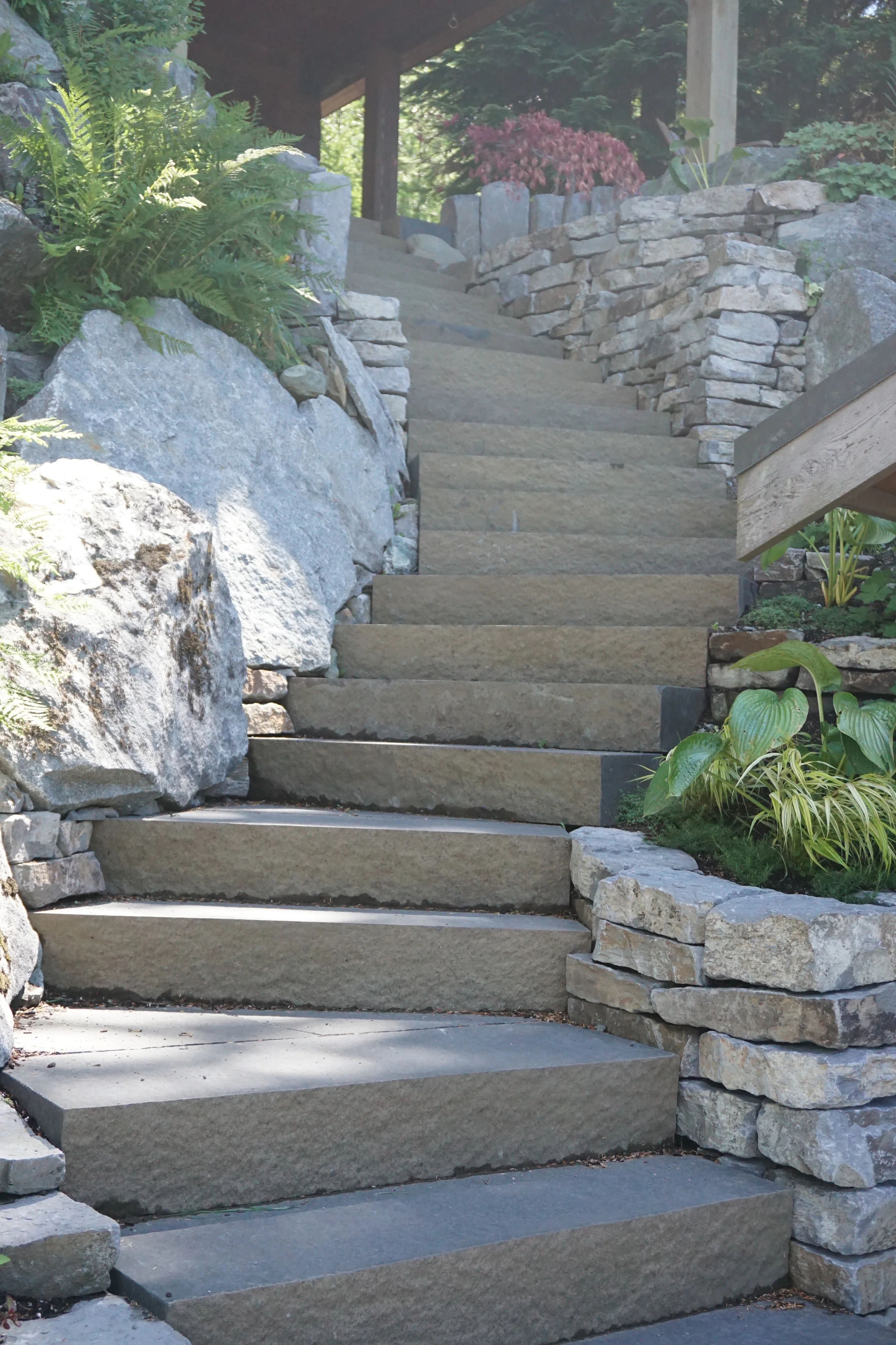 7. Weathered faced black basalt stairs.