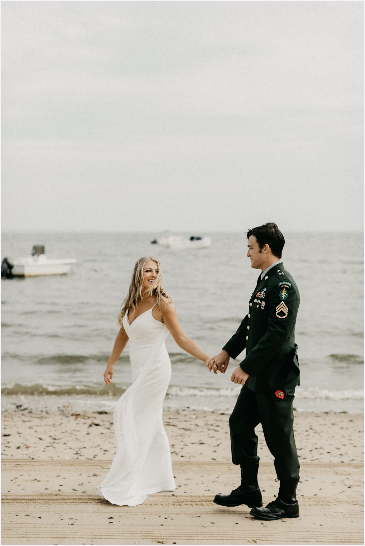 Bride and groom at the beach by the Chequessett Yacht &amp; Country Club