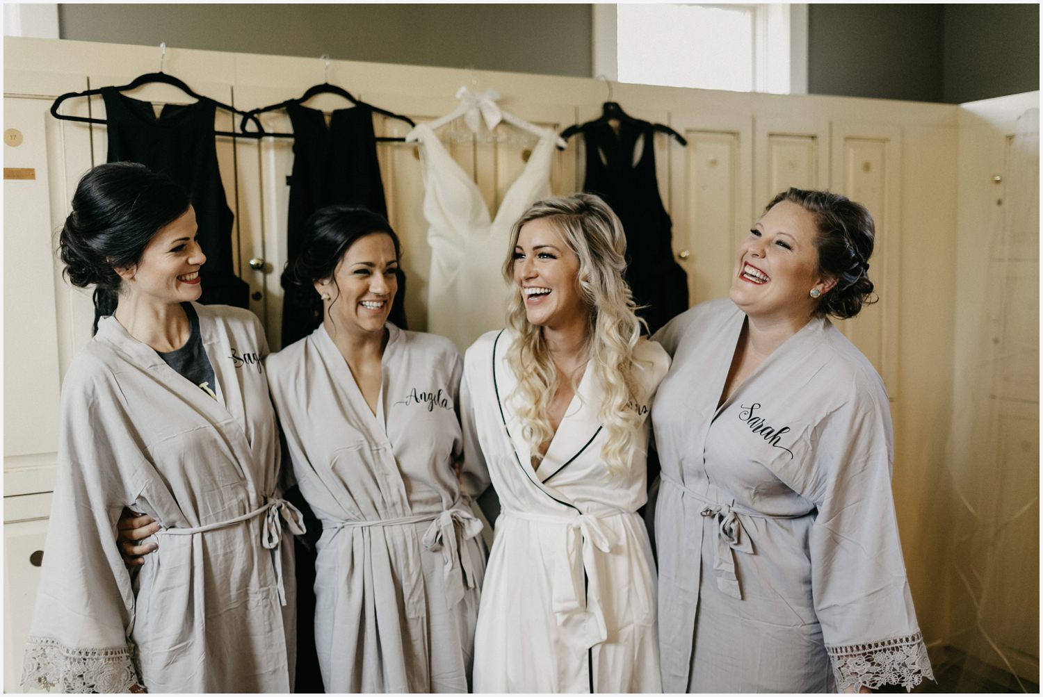 Bride laughing with bridesmaids at her Shark's Tooth Golf Club Wedding