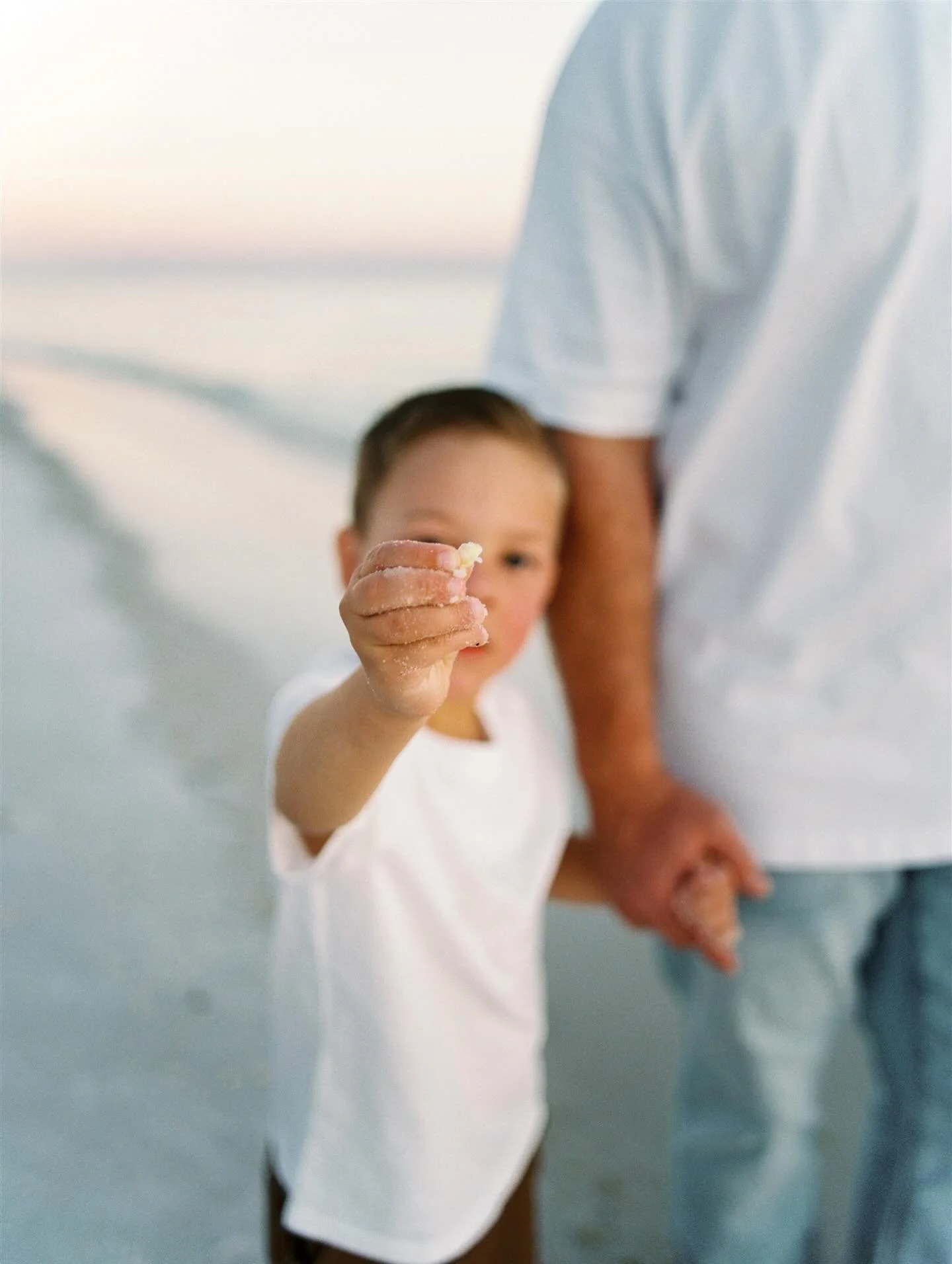 &bull; WATERCOLOR, FL &bull; Just a a boy and his family exploring the beach and collecting shells as summer gives way to fall. Kodak Portra film captured it all perfectly.

#watercolorfl #30aphotographer #30afilmphotographer #30a