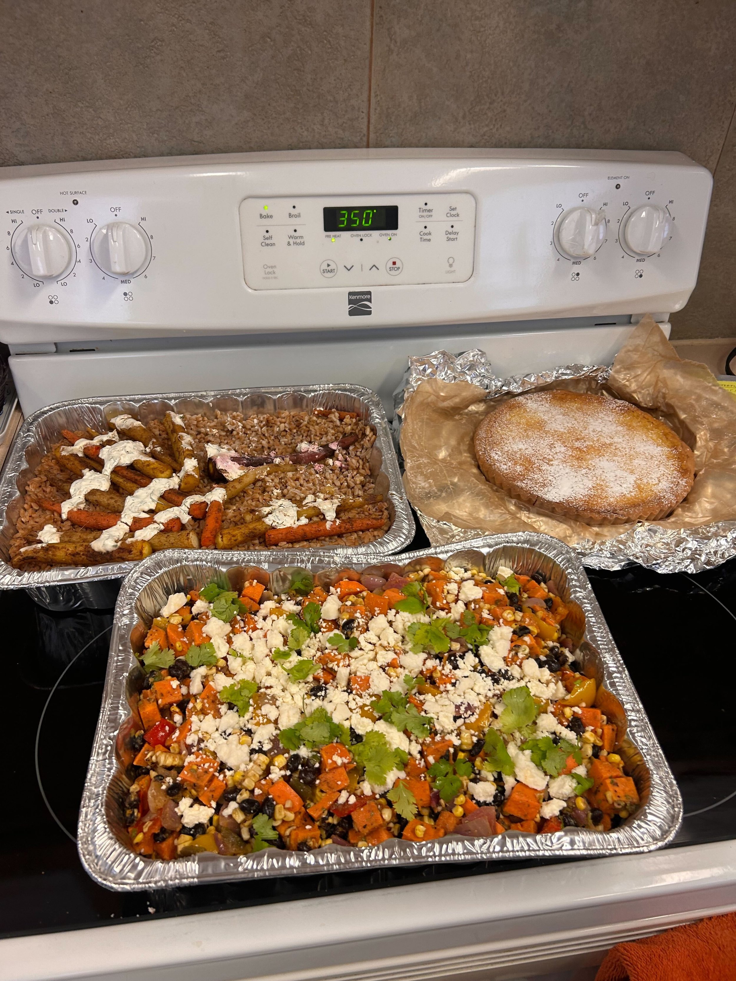  Sweet potato salad with cilantro, corn and black beans, farro with roasted carrots, lemon tart, meatloaf (not shown) 