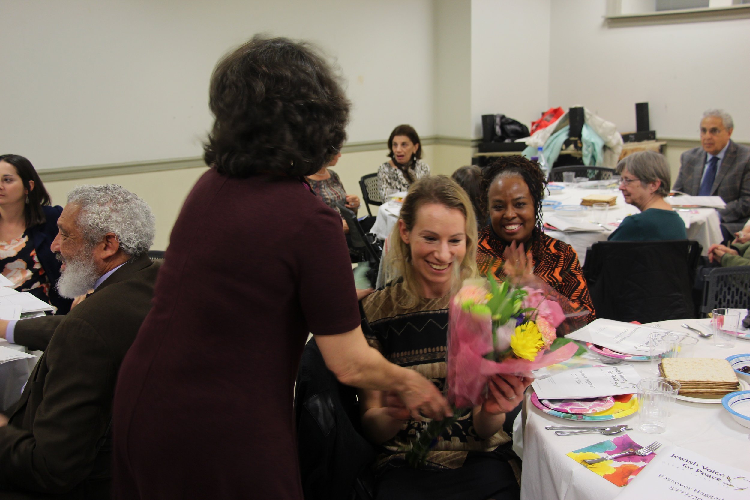 Sandy receives flowers.jpg