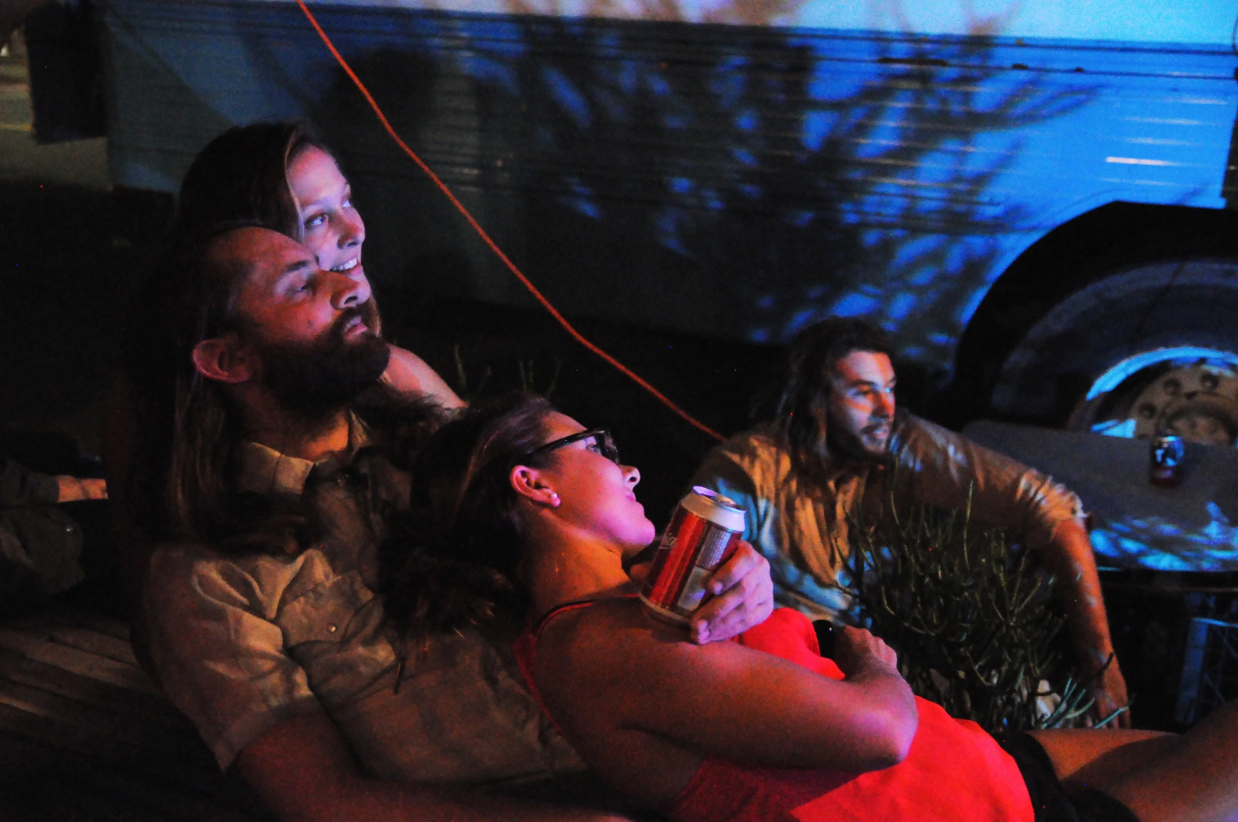 James' partner Laura, James, and their friend Kate cuddling to Derek's set, Wiley working sound.