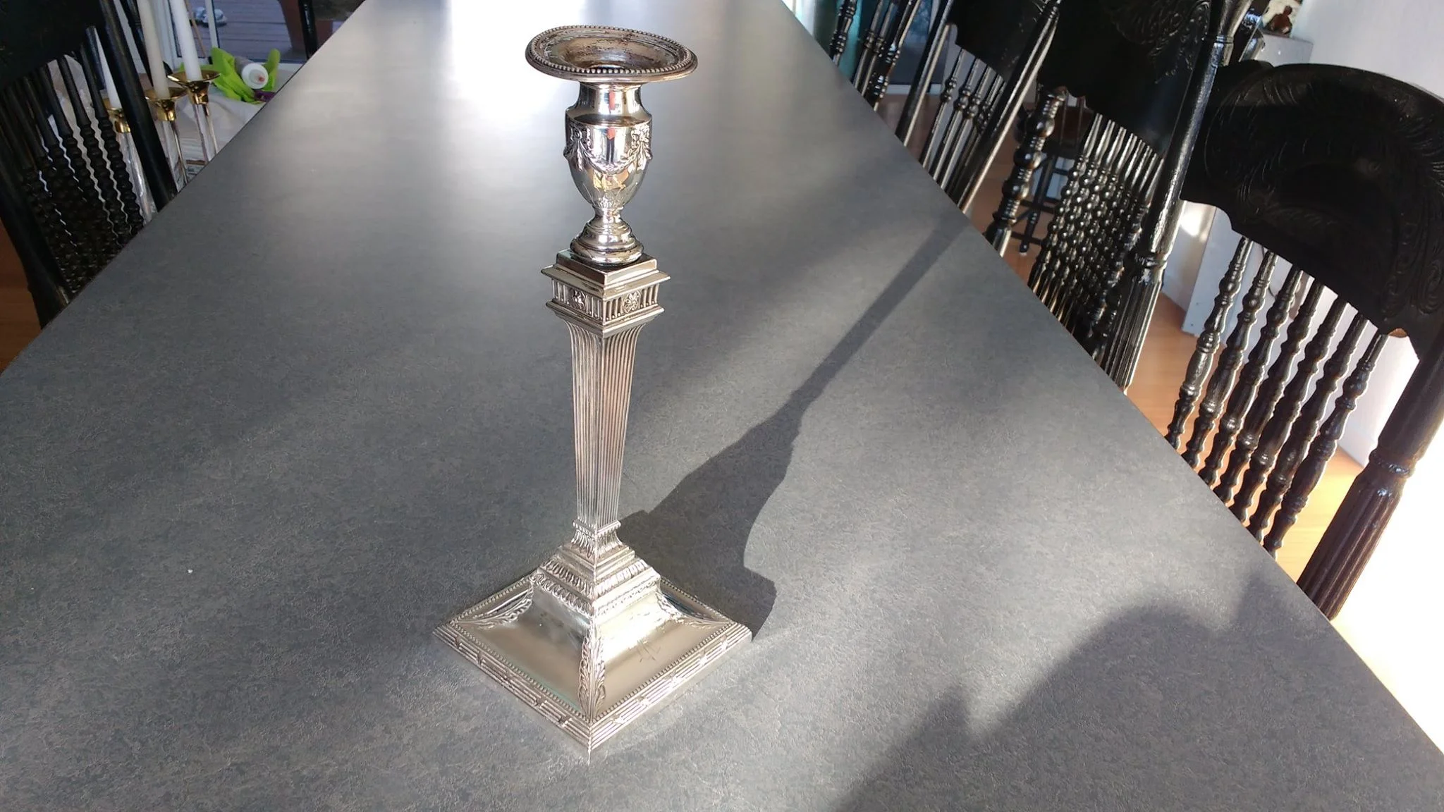 19th century silver candlestick after repair and polishing