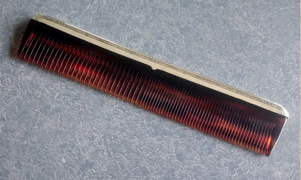 sterling silver men's comb with a new comb replacement