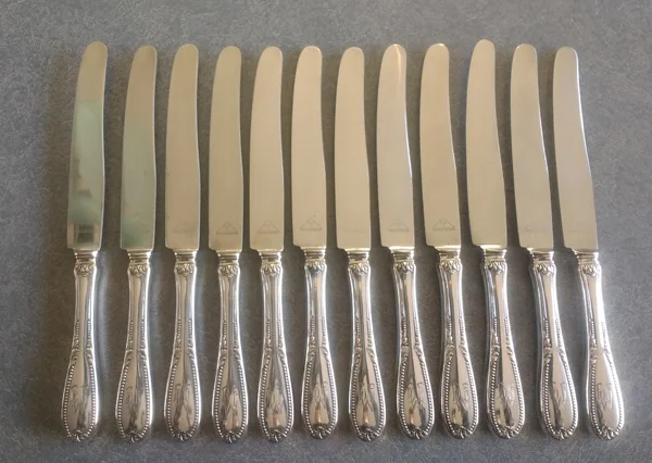 Knives reset into the sterling silver handles