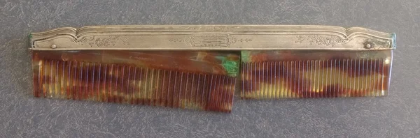sterling silver fitter with broken comb has green corrosion