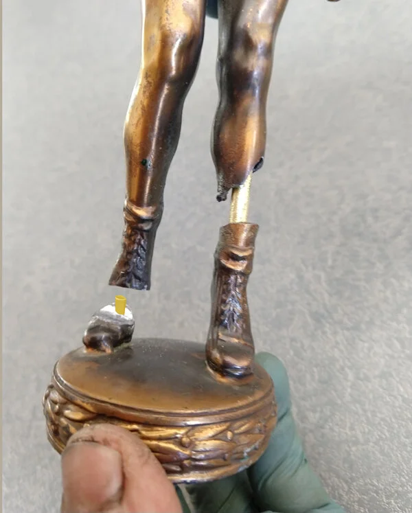 Repairing Athletic Figure trophies adding internal support
