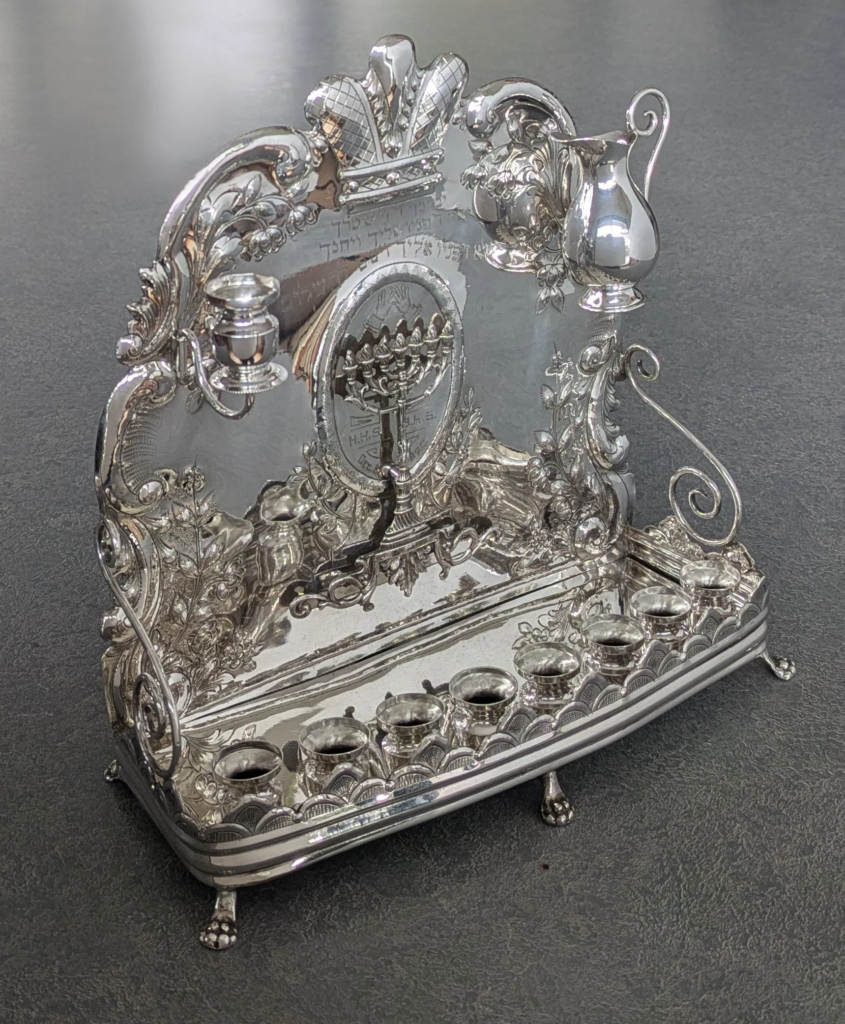 sterling silver Menorah from 1920 after professional polishing removing scratches and knife marks.