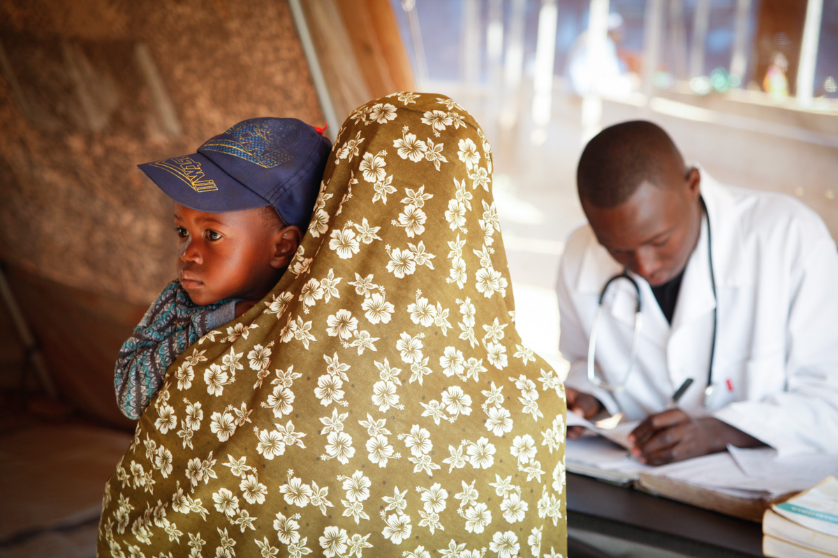 Dr. Abdon consults a mother about her sick baby boy.