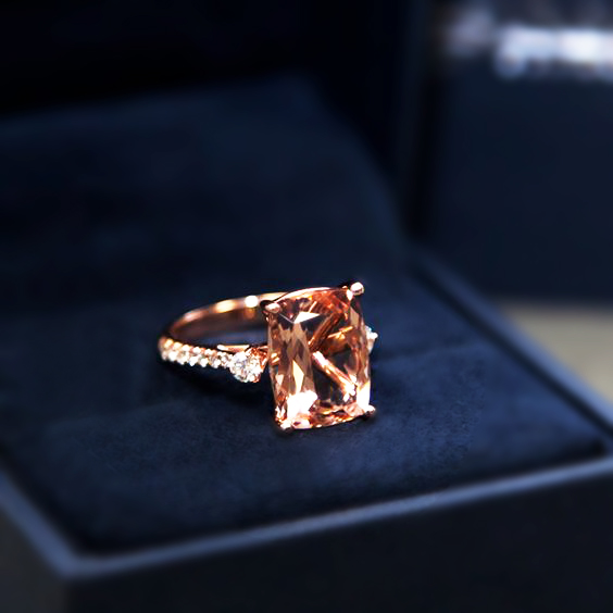 Custom morganite and diamond rose gold ring by Coast Diamonds .