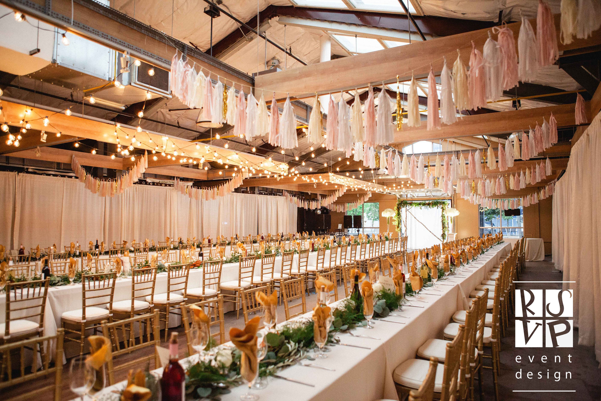 Awarded Best Wedding under 75K in Canada at the Canadian Event Industry Awards in Toronto, this natural and organic wedding took place at the Saskatoon Farmer's Market. Tassel bunting, hanging lights and stunning florals by Blossoms Living made this a wedding to remember. The entire set up was completed in just 2.5 hours as the Market was open until 3:00 the day of the wedding. What amazing work by RSVP's talented team! Photo: Chelsea Klette Photography