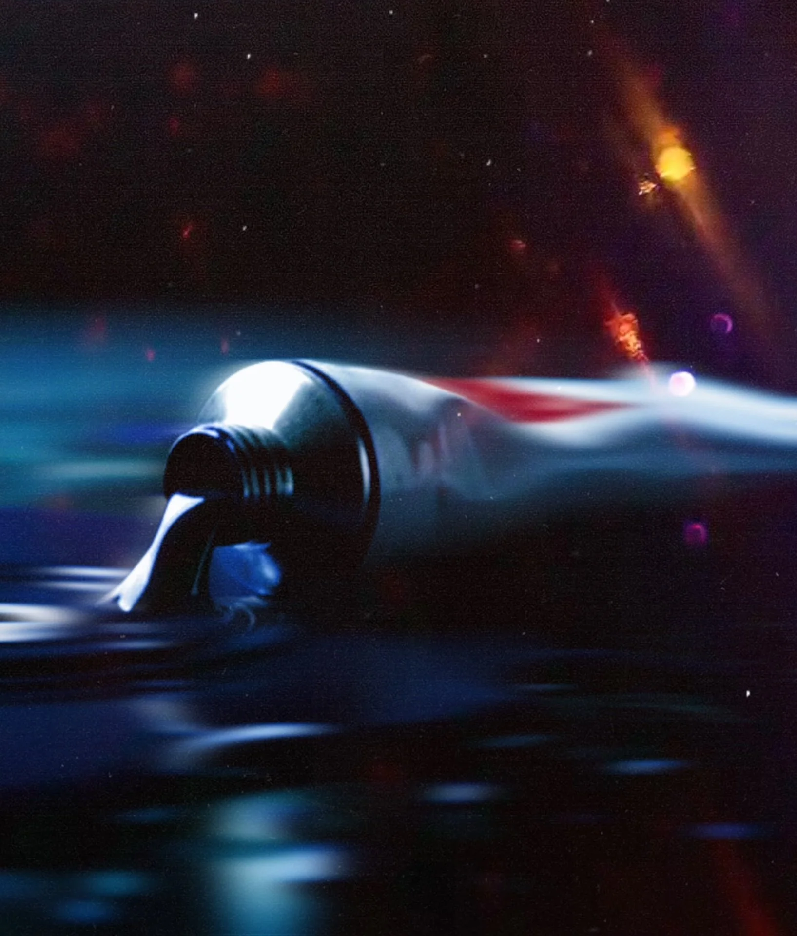 A glowing tube emitting blue and white light, submerged in dark water with bubbles and particles around.