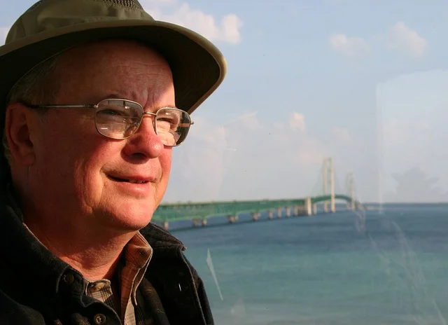 Ypsi Project : Dave Hamilton
Thanks to Dave Hamilton for submitting a photo of himself near the Mackinac Bridge! Dave moved to Ypsi in 1968 to attend EMU. After graduating he decided to stay. While he is not a native he feels like one.
More than likely you’ve seen Dave’s signs around town. He has sold and leased commercial real estate for Swisher Commercial for 40 years. He has helped some Ypsi greats such as Beezy’s Cafe and Liquid Swordz obtain their locations. I guess that makes Dave an Ypsi great himself :)