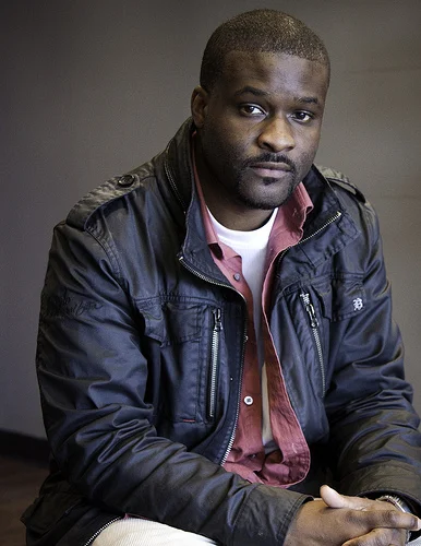 Ypsi Project: Kevin Frye (by ericarhiannon )
Kevin was born and raised in Ypsi. He briefly lived in Atlanta but he and his wife moved back in 2006 to raise their family. For 6 years he and his father have run SOAR , a mentoring program at Parkridge community center. Before the program was run through Parkridge, they used the space that is now Marlita’s Signature Shoes at 123 N. Washington. Newly opened and the only shoe store in town, Kevin and his partner Marlita Blackman are now the source for your shoe addiction. :)