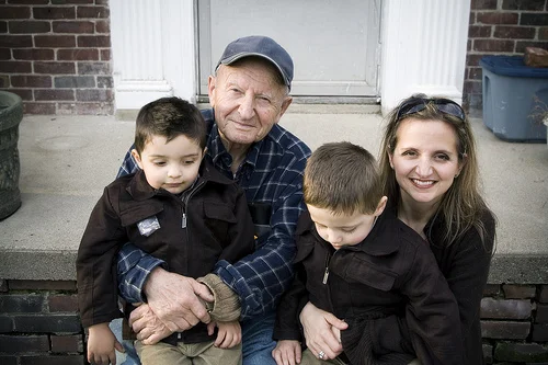 Ypsi Project : Professor Nicholas Beltsos, Demetrios, Niko and Vasilia Tsilimingras (via ericarhiannon )
While on a bike ride today I passed by a man and two young boys. I turned around and decided to ask if I could photograph them for the YP. Obviously, they agreed. Nicholas and his daughter Vasilia were so friendly, inquisitive and open about themselves. We only were able to chat for a minute before the boys became bored and their infant sister needed some attention too. Nicholas Beltsos, or Pappou moved from Dearborn to Ypsilanti (to the same house you see behind them) in 1967. His son was five and his daughter, Vasilia, was yet to be born. Nicholas was a professor of Economics at EMU. Pictured here are Nicholas, his daughter Vasilia and twin grandsons Demetrios and Niko.
