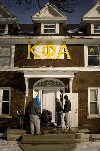 Ypsi Project : Kappa Phi Alpha (via ericarhiannon )
Xander and I took a walk today while the sun was shining and warm. We passed these Kappa Phi Alpha members fixing the front door to the fraternity house.