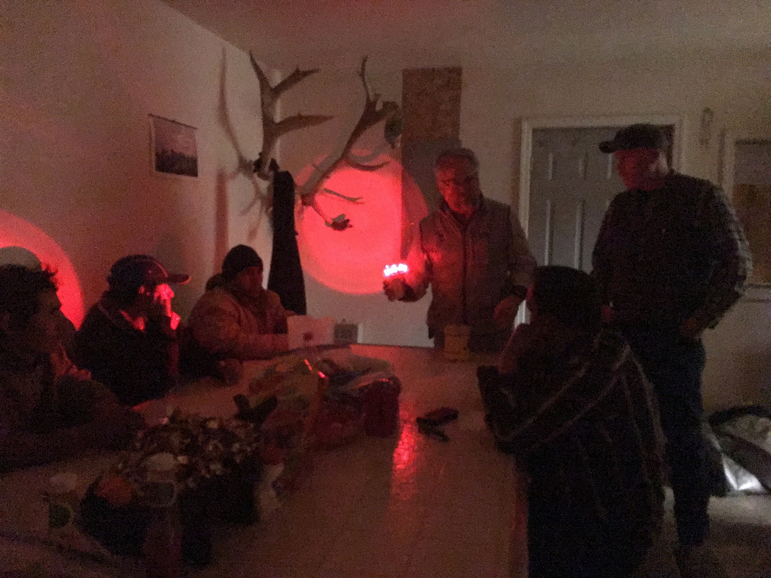 Brian Bean and Kurt Holtzen showing herders at Kowitz Sheep Company how to use Foxlights at a training session in March 2016. Photo: Avery Shawler