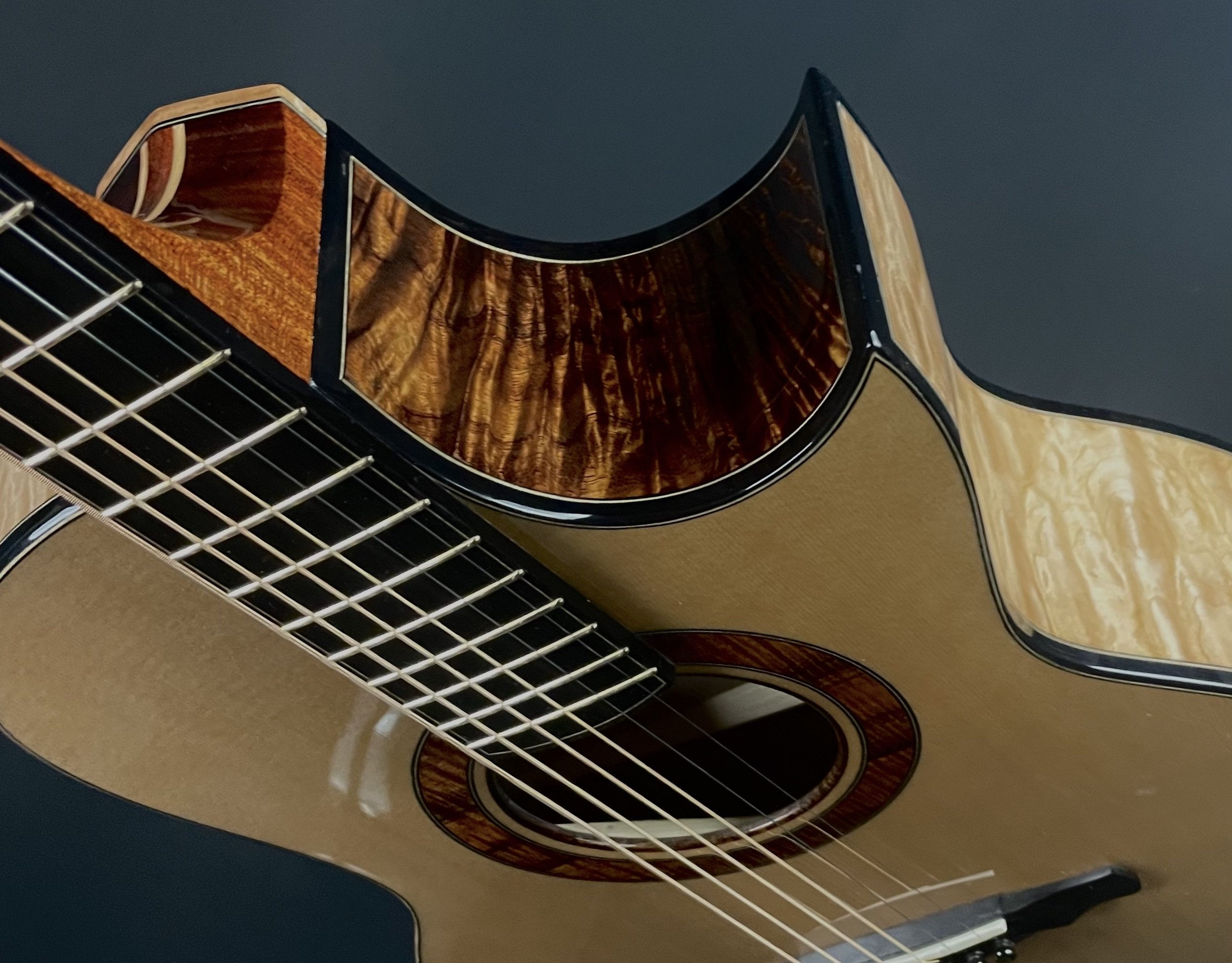 Irv SP Maple quilted cutaway angle.jpg