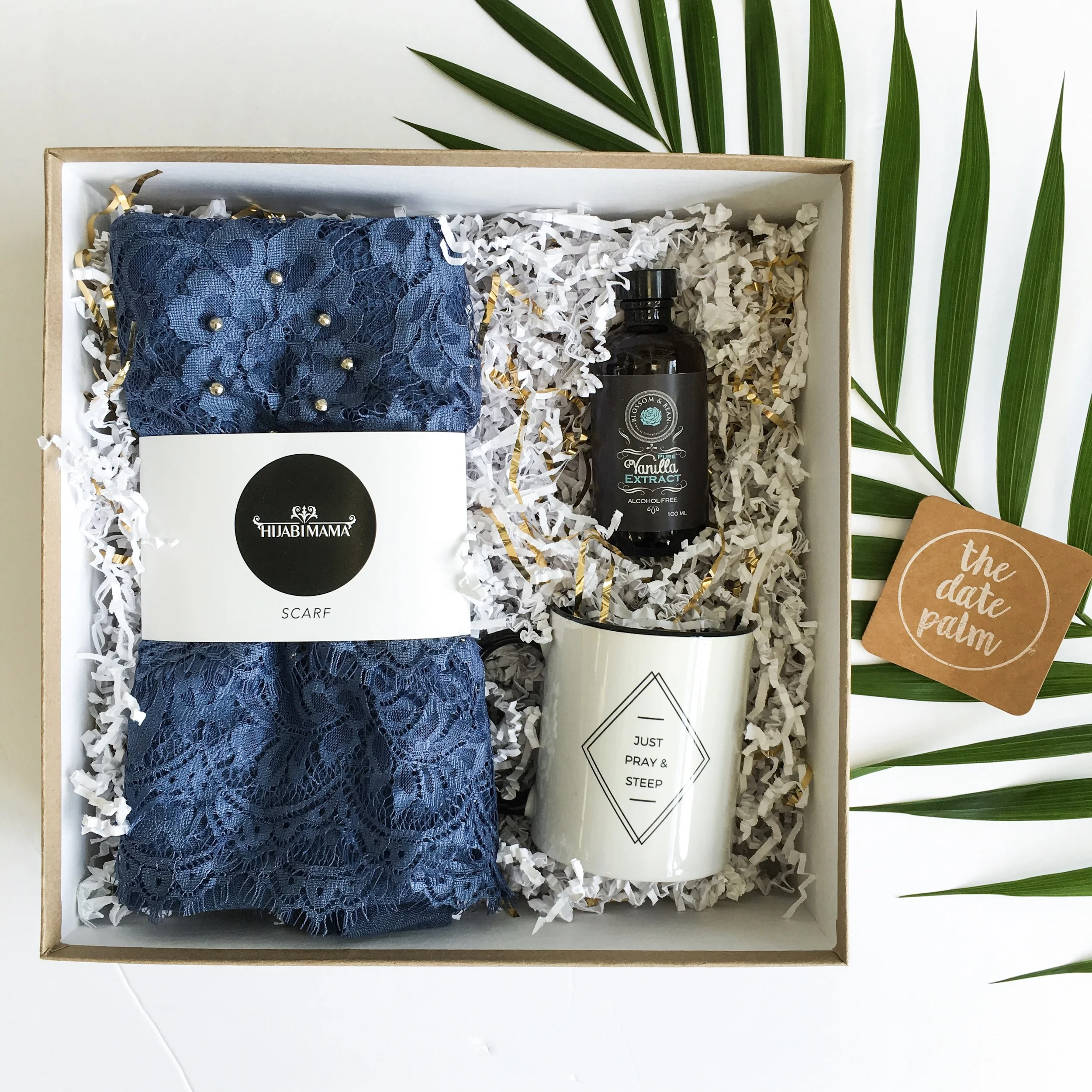 The DP Mother' Day Gift Box contains a Hijabimama lace trim hijab, a bottle of halal Vanilla Extract from Blossom & Bean and a Just Pray & Steep mug from Eastern Toybox. A complimentary Date Palm notecard is also included. Please feel free to email or call us ahead a time to order a gift box as inventory is limited. Hello@thedatepalm.com / 905-554-8000