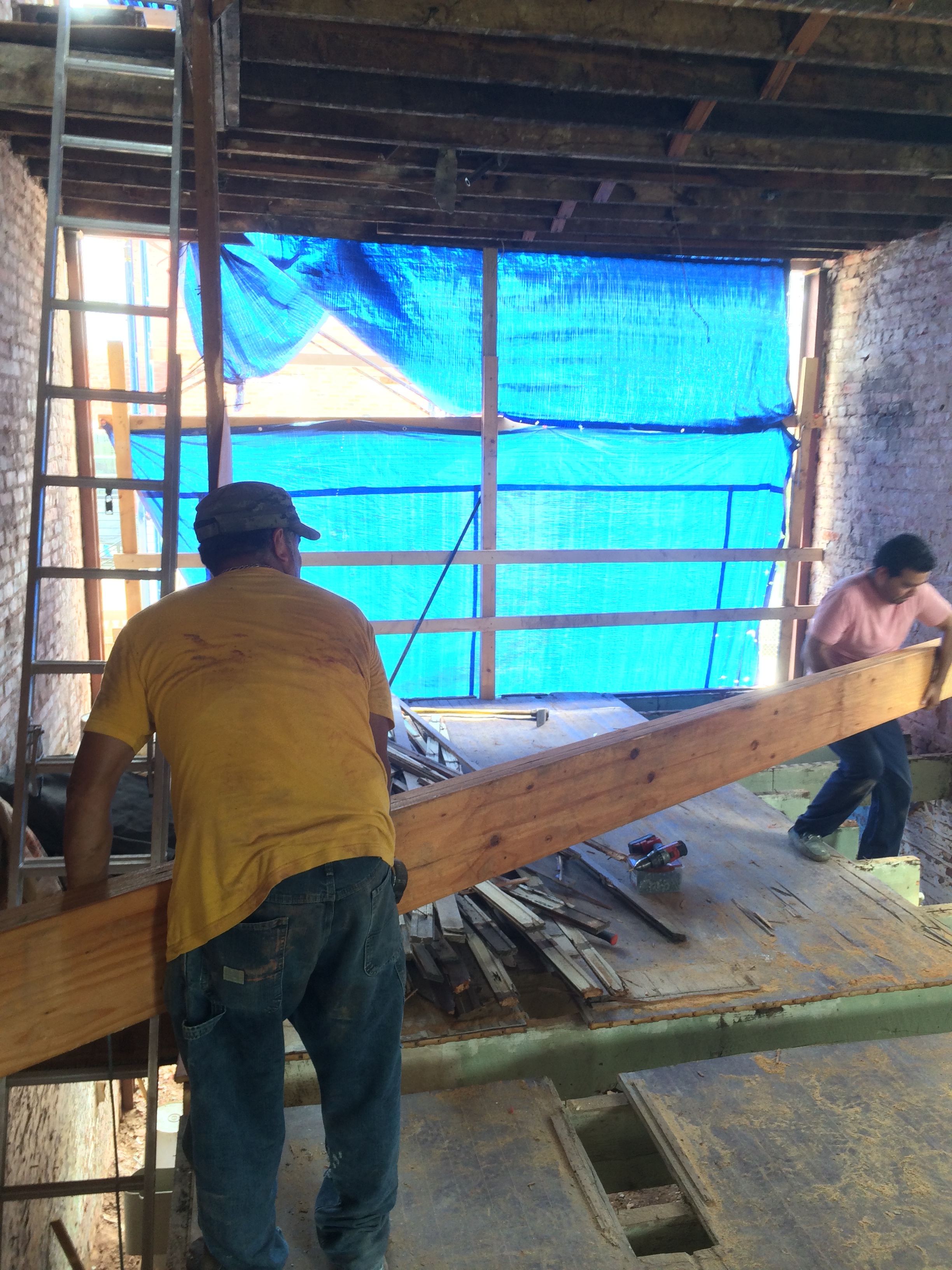 Lifting the new beam into place