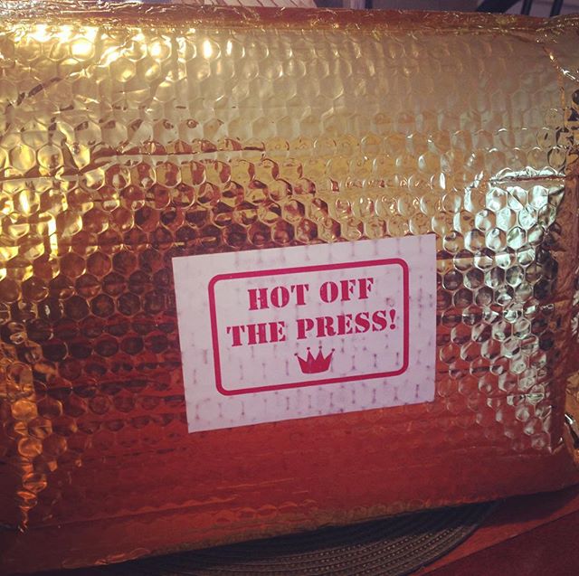 Hmmm...what could be in this fancy gold package from Random House?