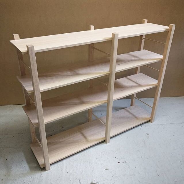 Small minimal bookshelf in natural red oak.