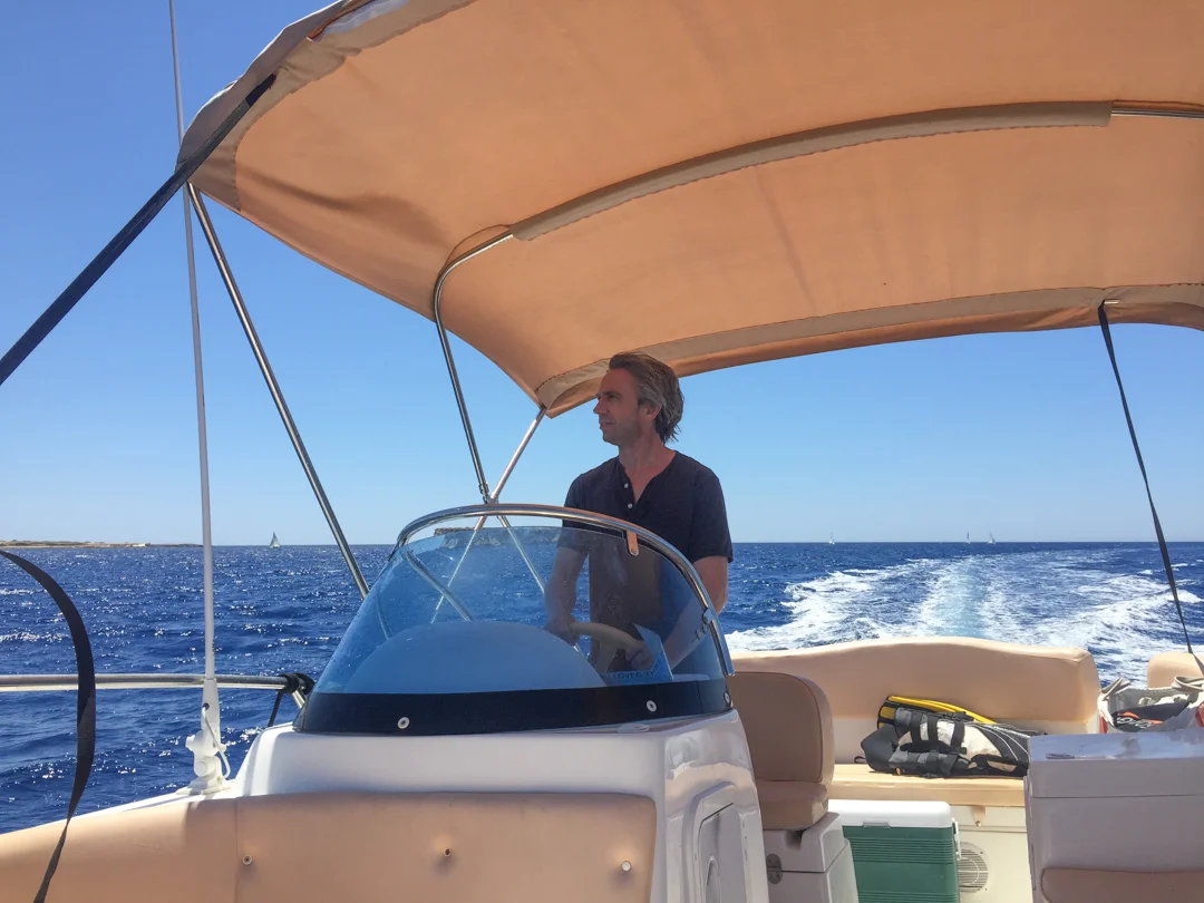 Enjoying a rental boot at Anassa