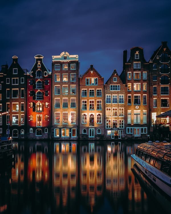 free-photo-of-illuminated-tenements-in-amsterdam.jpeg
