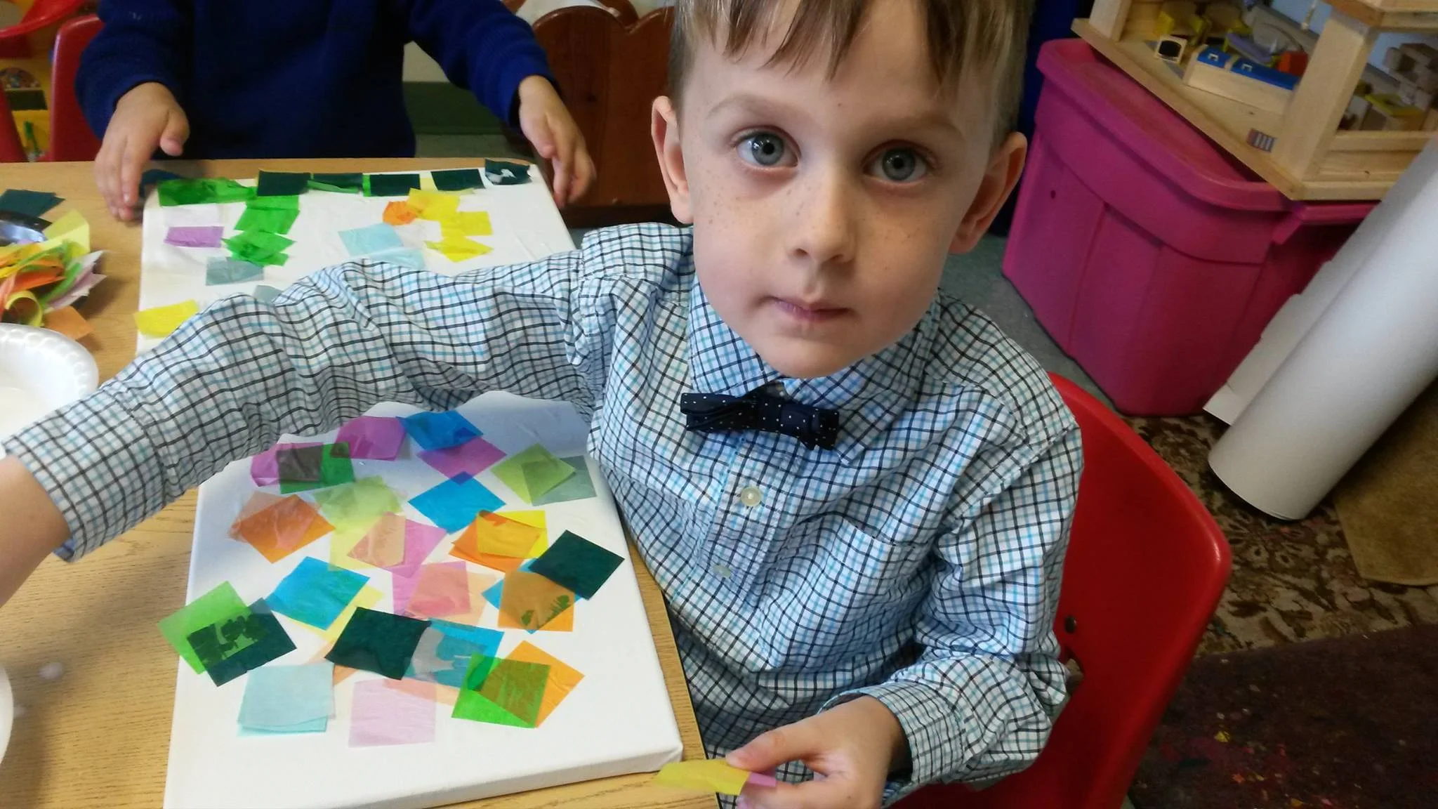Student working on his impressionist art piece