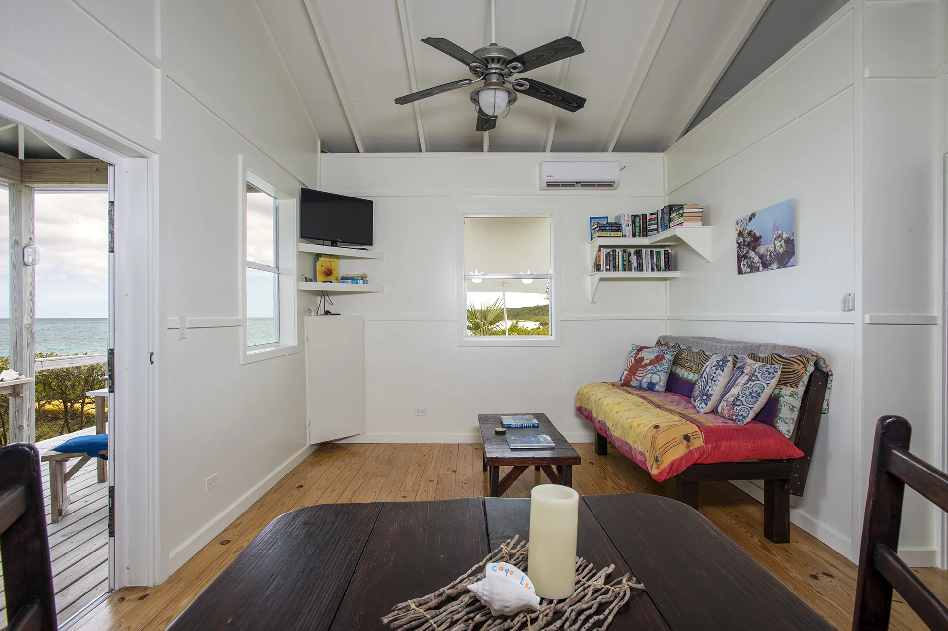 Oceanside relaxing in your beachfront dining and living area!.jpg