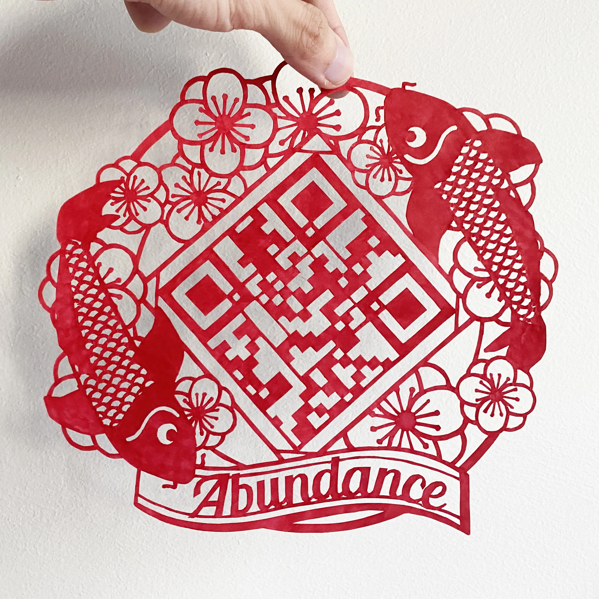  Abundance word in the QR code Papercut, hand cut with scissor.年年有魚字QR码手工剪纸。  