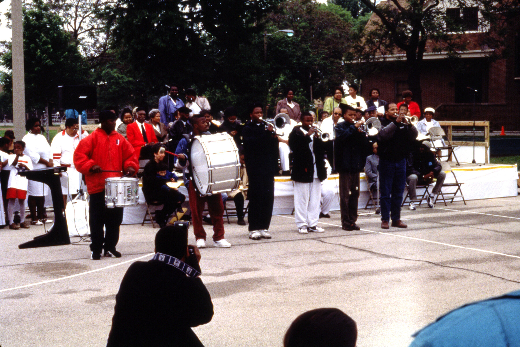  Opening ceremony with performances by the Henry Horner Homes Drum and Bugle Corps and the Frist Baptist Congregational Church Gospel Choir. 