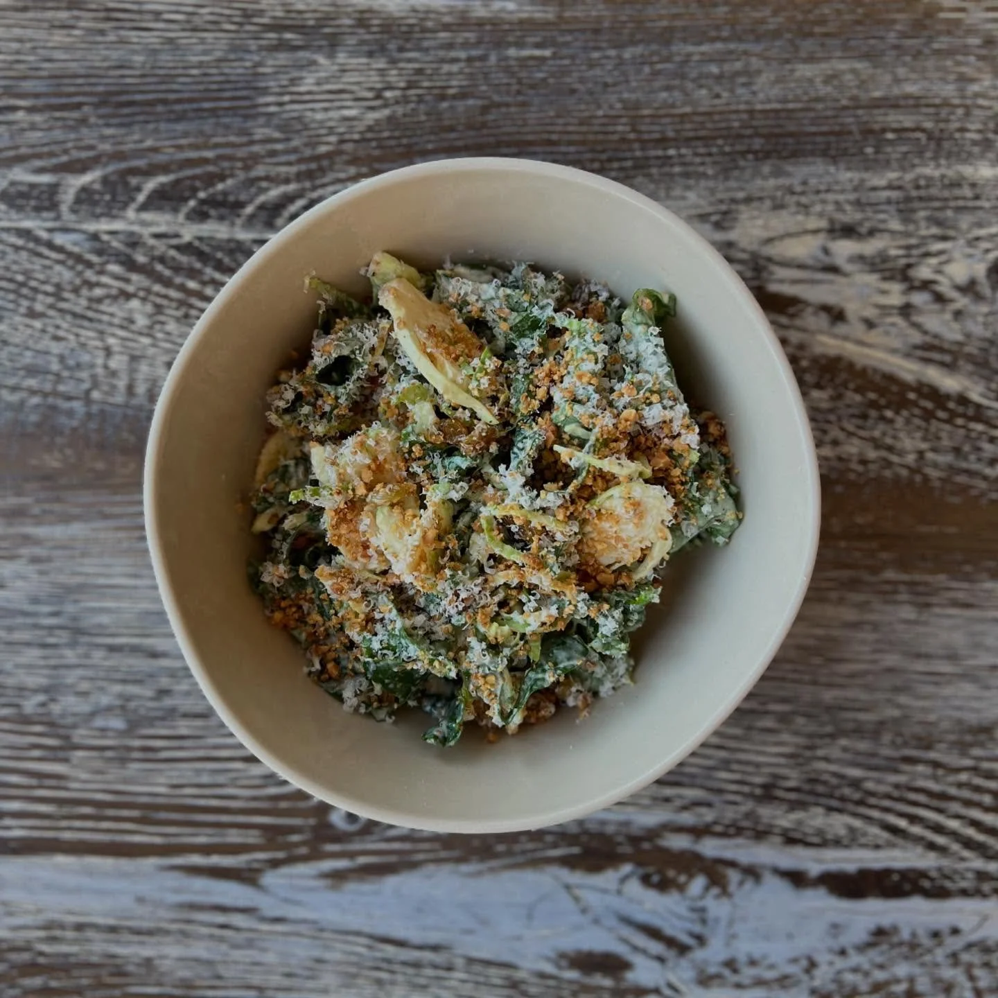 Kale &amp; Brussels Caesar, golden raisin, hazelnut, parmesan. Back on the dinner menu!