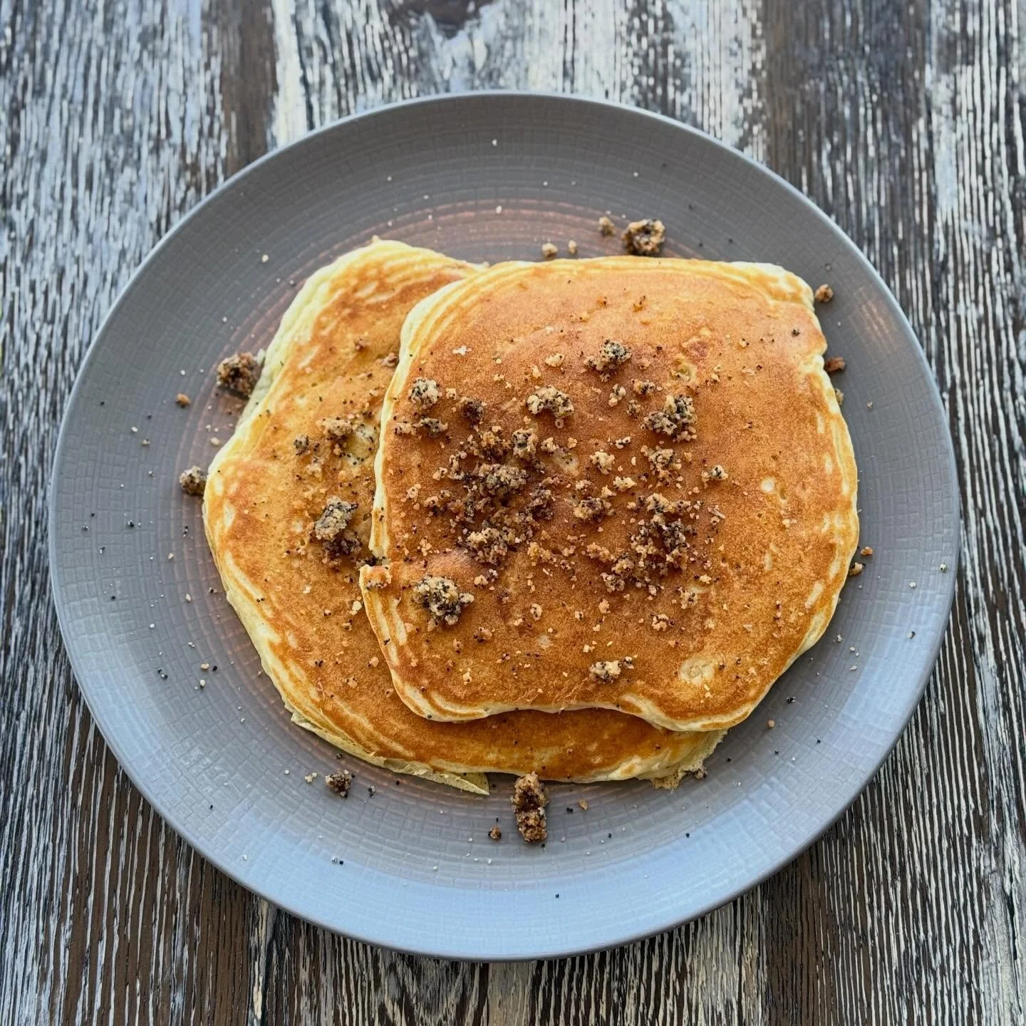 Lemon poppyseed pancakes now on the brunch menu! We start with our lemon ricotta pancakes, swirl in &amp; top with a poppyseed streusel