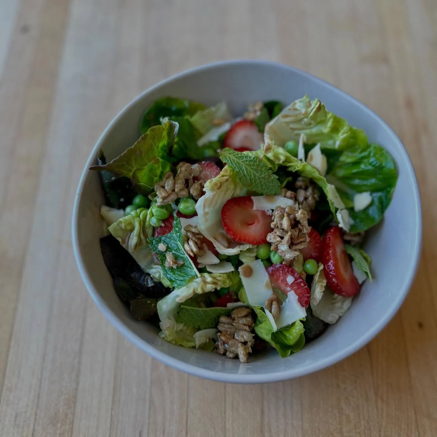 Strawberry &amp; English Pea Salad, baby lettuces, sunflower brittle, balsamic, aged cheddar. New dinner salad! 🍓🫛🥬🧀🌿