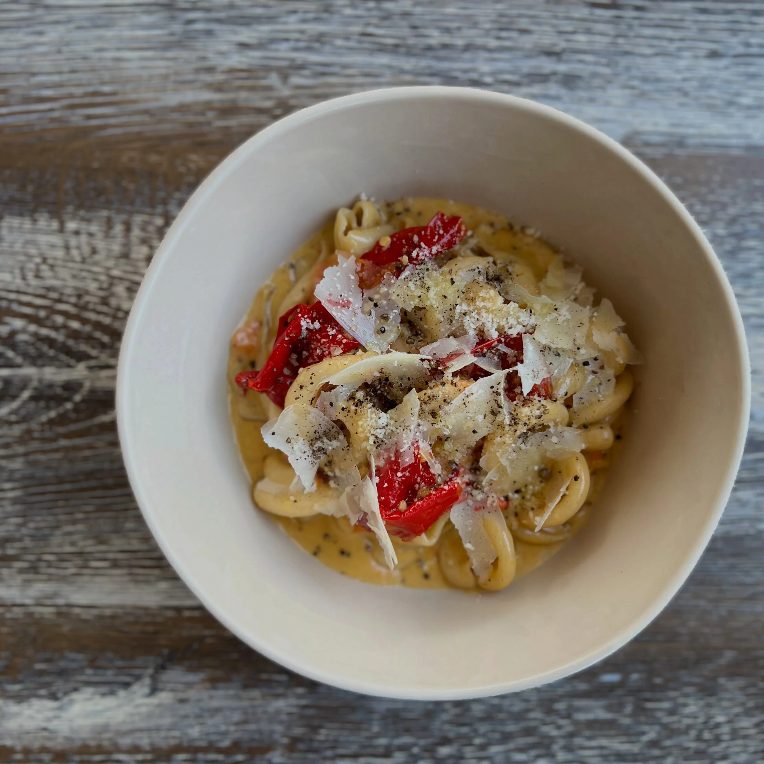 Summerizing one of our most popular pasta dishes. Sourdough Girelle Cacio e Pepe, with sungold butter &amp; roasted jimmy nardello peppers.