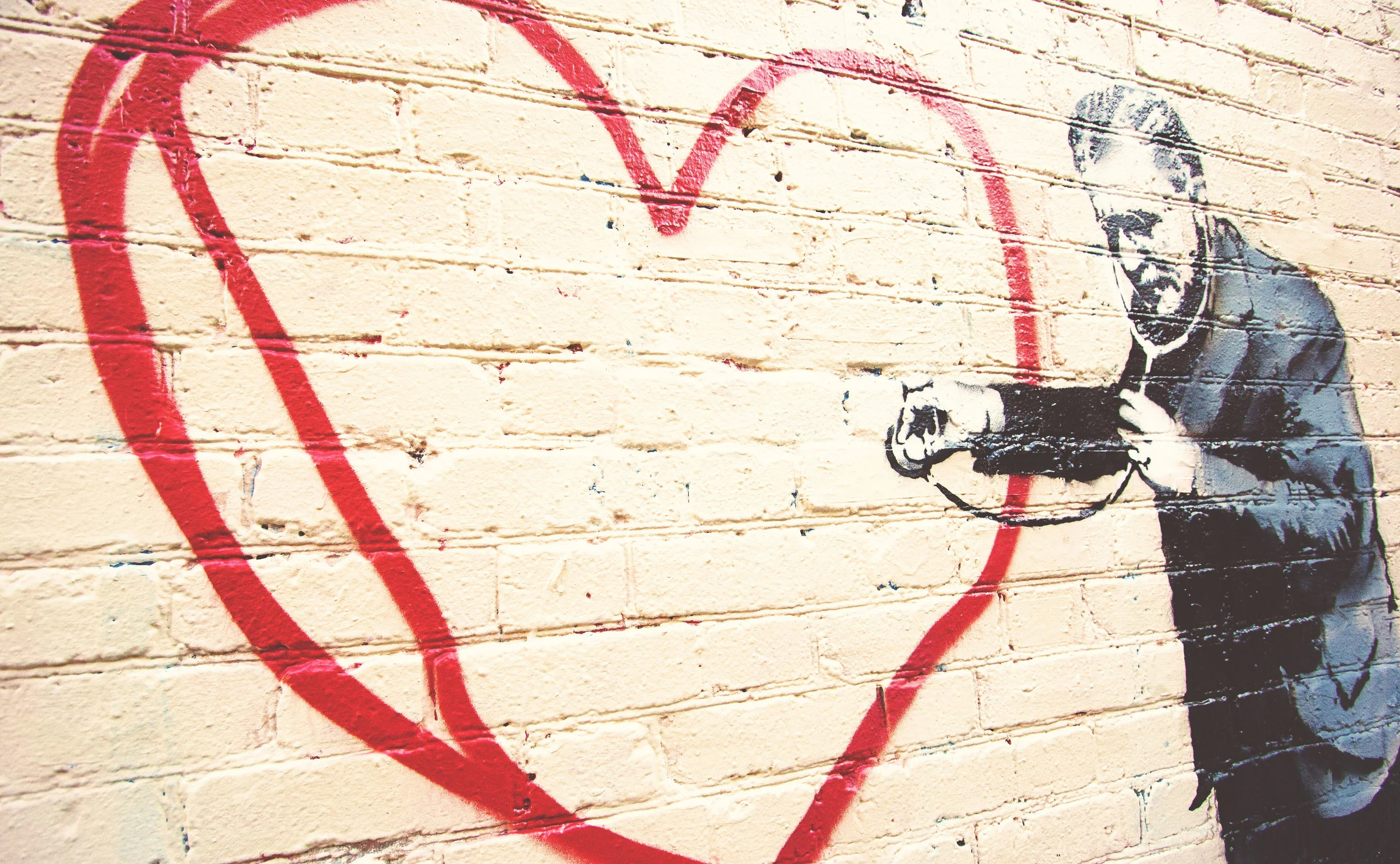 Art: Banksy. Photo by Kanaka .