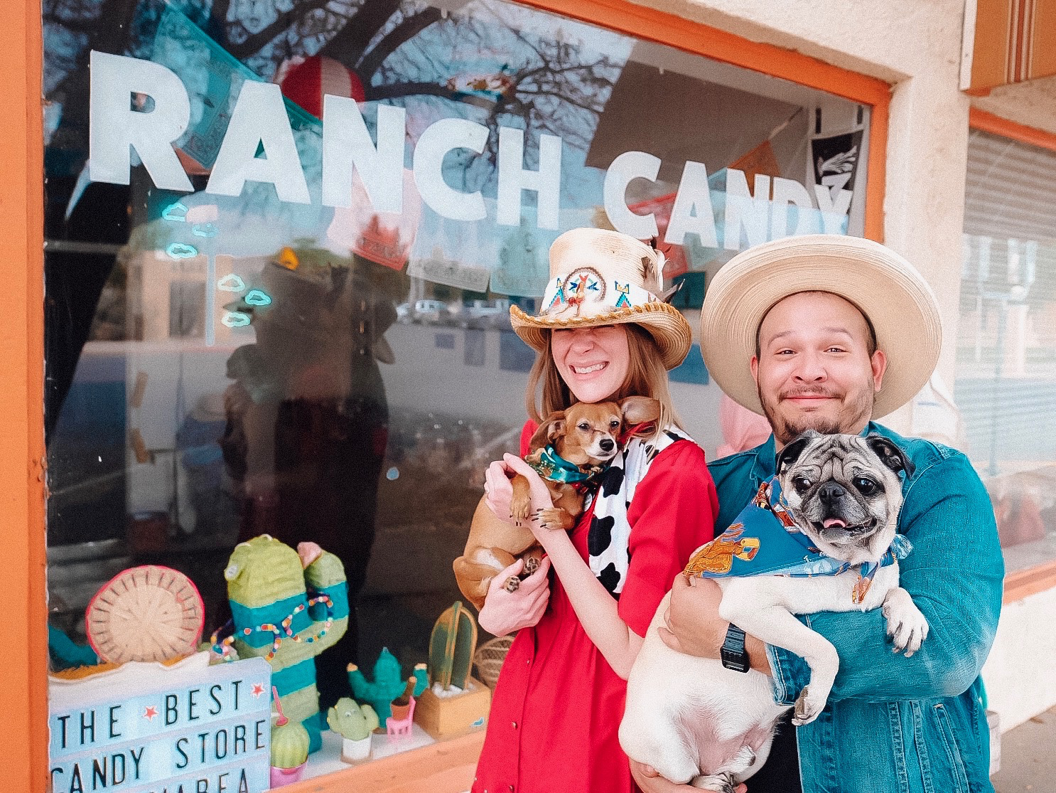The new Ranch Candy owners Hannah Marshall and Stephen Treviño with their dogs, Lucy and Pickles.