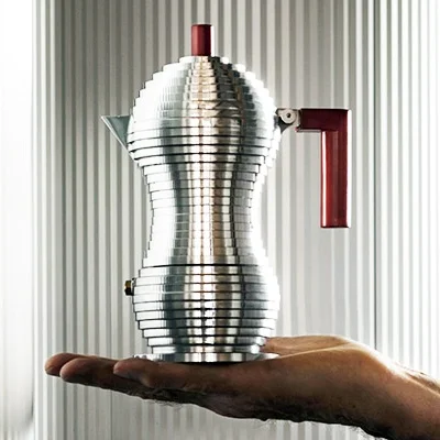 Alessi Pulcina Moka Pulcina coffee maker, designed by Michele de Lucchi, is a revolutionary moka that combines the technology developed by illycaffè, using the design experience and manufacturing capabilities of Alessi, my former employer. Made of aluminium casting, Pulcina encapsulates a small but substantial design innovation: its shape that makes it possible to prepare a practically perfect coffee! Pulcina comes from a research entirely dedicated to the design and functionality of the espresso coffee maker. As a result of this study and the application of the technology developed by illycaffè, Pulcina is a high-performance coffee maker with a boiler that stops dispensing the drink at the right time before the coffee gets a bitter aftertaste. The perfect cup, made by you, at home.