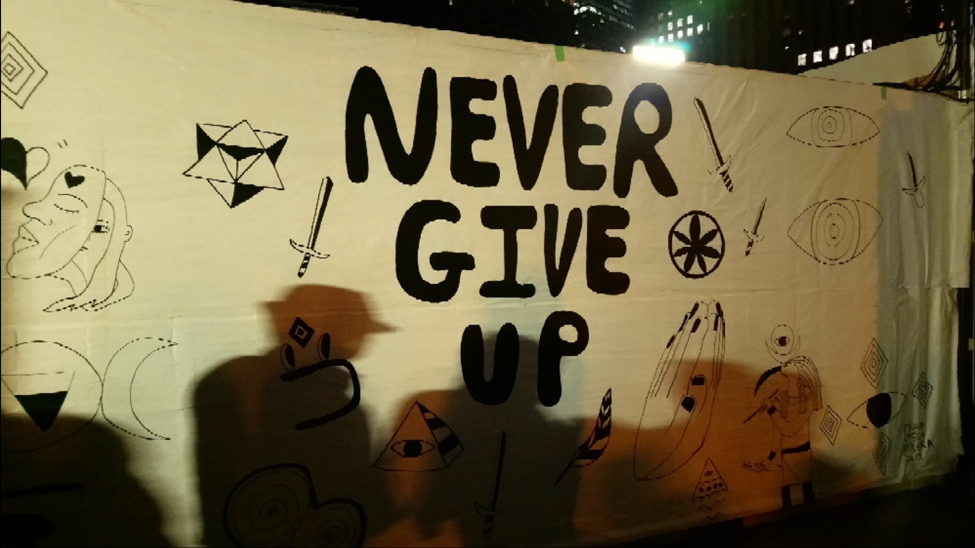 Slogans and images covering OCAP shipping container, pictured above. Banners of protest and celebration were hung throughout. Photos by author.