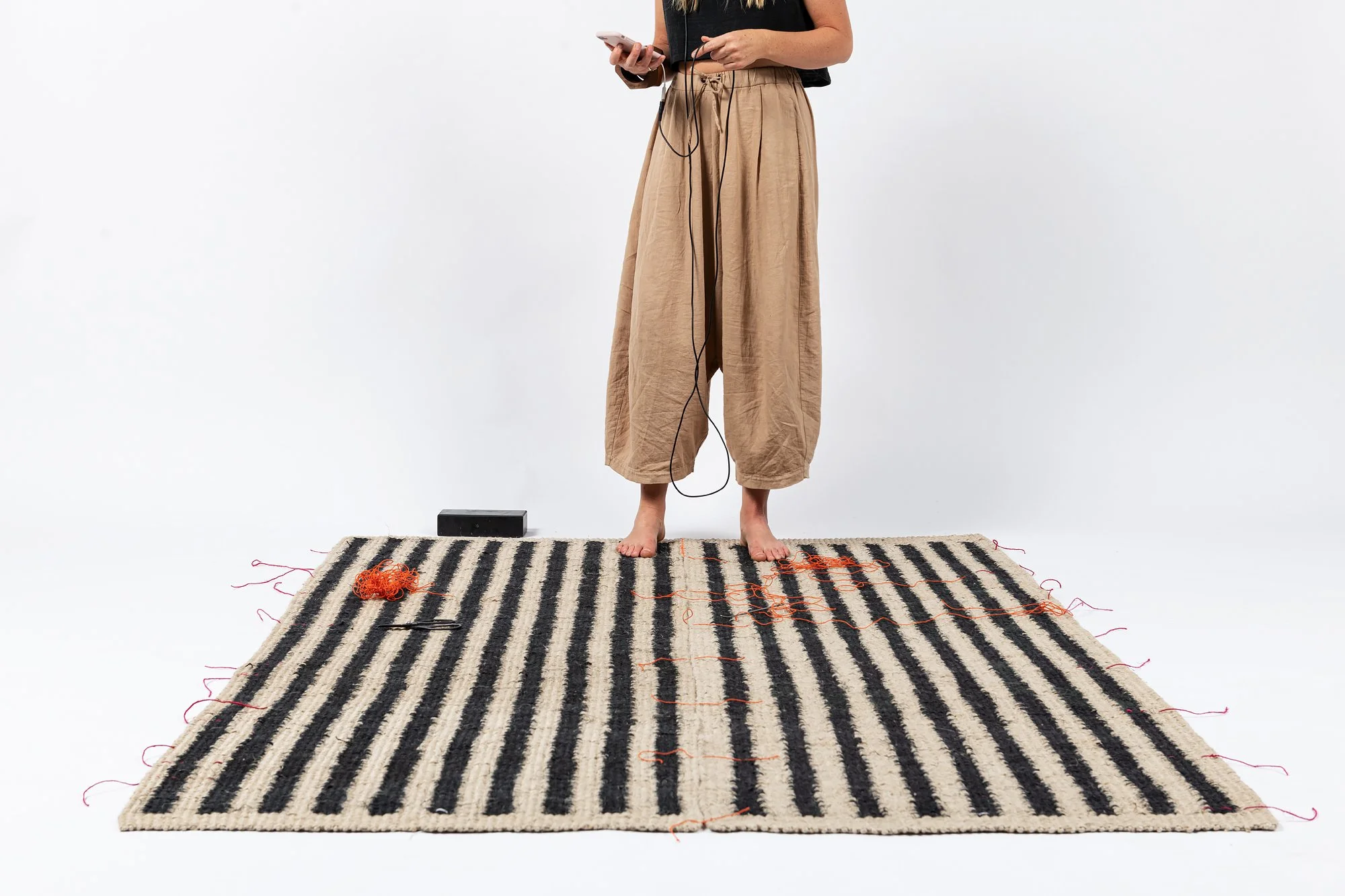 natural stripe rug. handwoven rug. black white stripe rug.