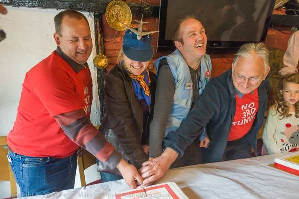 Campaigners from other groups fighting Heathrow expansion cut the cakes