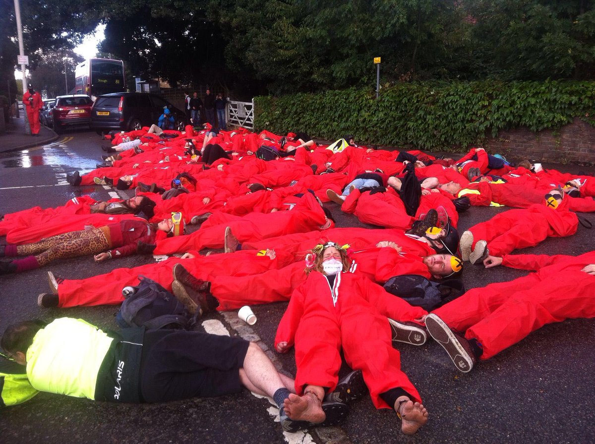 Braving the rain to raise awareness of deaths caused by climate change.