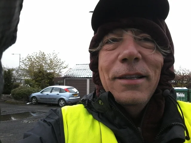 Snow on the rooftops and cars - good job Neil can laugh about it. 