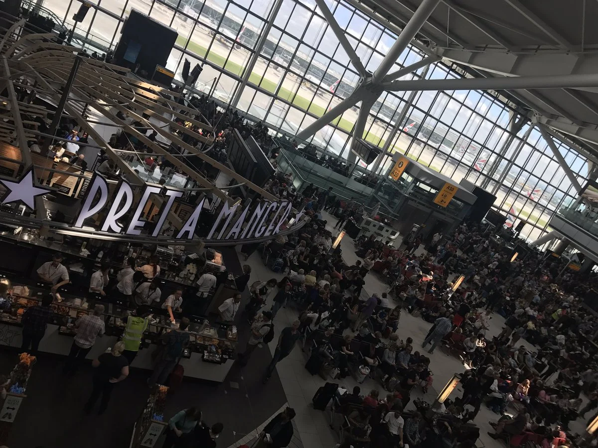 Wise people are enjoying the weather outside - not herded like cattle inside waiting for flights